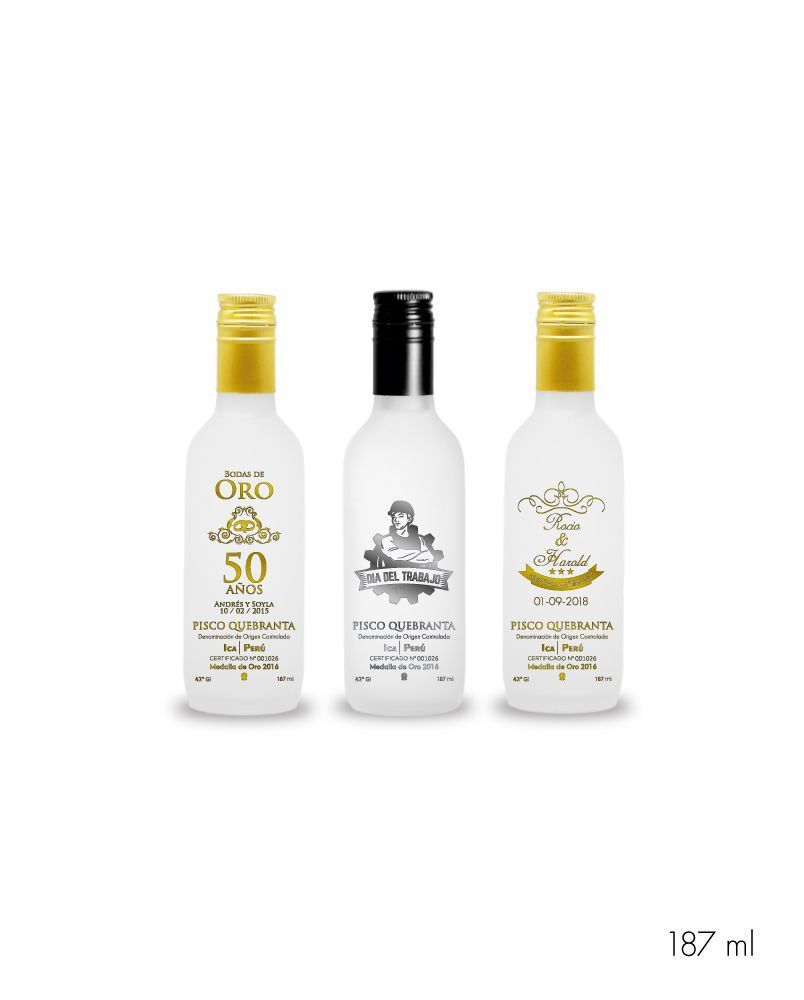 Botellas grabadas con diseño dorado y plateado